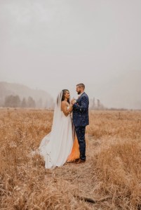 rocky mountain elopement - estes park colorado - rocky mountain national park - interracial couple elopement - love gazing in the snow 2
