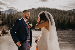 rocky mountain elopement - estes park colorado - rocky mountain national park - interracial couple elopement - wedding vows